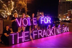 Denton fractivists light brigade