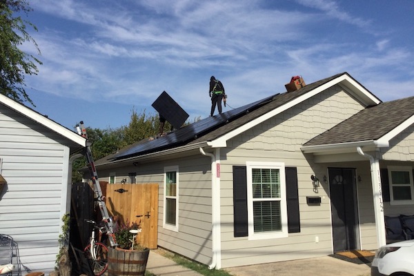 Afghan family gets help going solar in Plano.