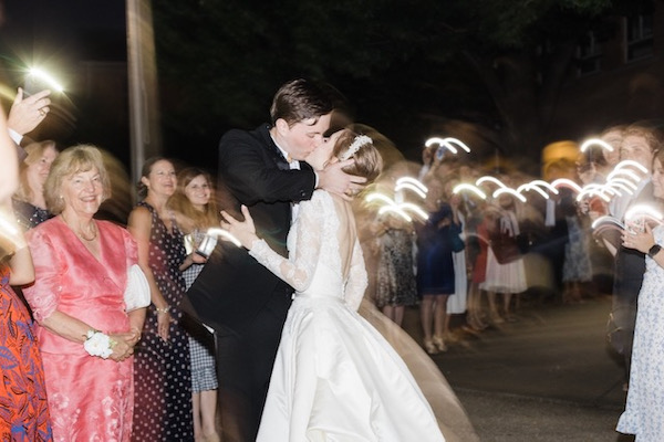 Guests used their phones to send the bride and groom off. Photo by Leah Jeffers.