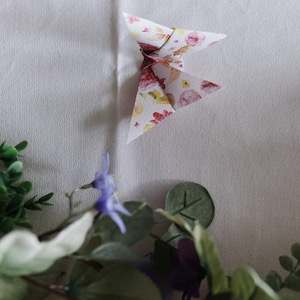 Origami butterflies were made by the mother of the bride's students. Photo by Leah Jeffers.