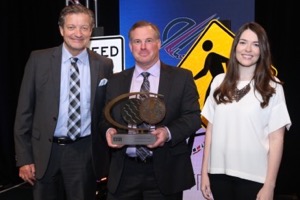 Ron Sherga and Hayley Sherga accept ISRI award