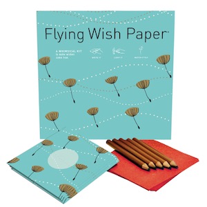 Write down your wish then light it and watch it rise. Courtesy of Flying Wish Paper.
