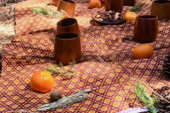 A table set for a tea ceremony in the forest. Photo by Amy Martin.