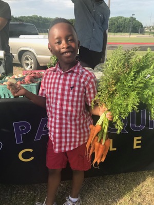 Young customer at Paul Quinn Market 