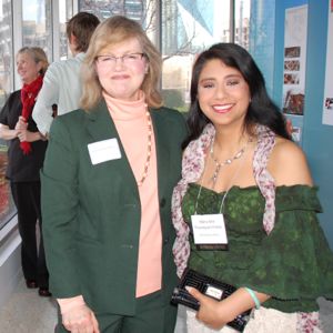 Georgeann Moss receives congratulations from Memnosyne cofounder Mary Ann Thompson-Frenk for winning the Green Source DFW Lifetime Achievement award in 2015. Photo by Libbie Simonton.