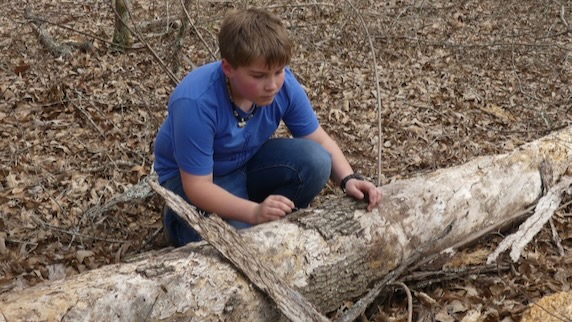 Boy at the Learning Gardens in Athens, Texas