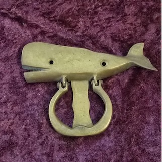 A whale-shaped door knocker from Orr-Reed Wrecking