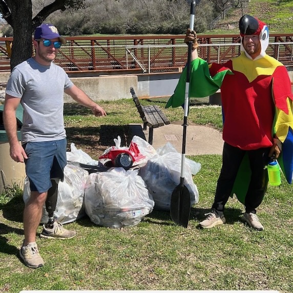 Members of the Fairmount Trash Pirates display their bounty of litter.
