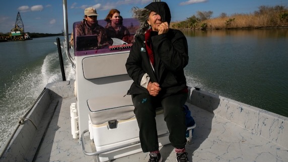 Diane Wilson and her boat captain Rusty