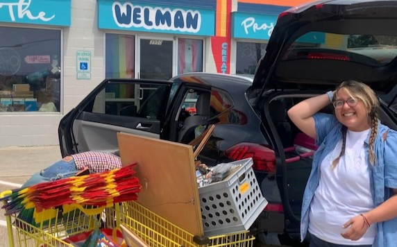 Teacher Dezarre Boone loads up with Welman supplies