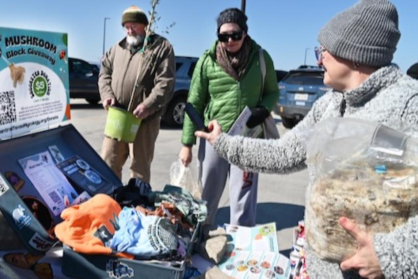 A mushroom block giveaway in Manor, Texas hosted by The Central Texas Mycology Society.