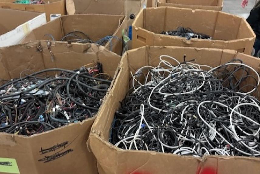 Boxes of cable and wiring await processing at URT.