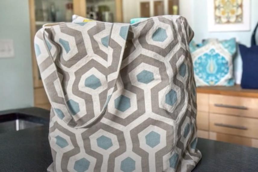 Hexagon-patterned tote bag on a kitchen counter.