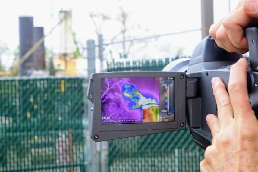 Thermal camera screen displaying a colorful heat map.