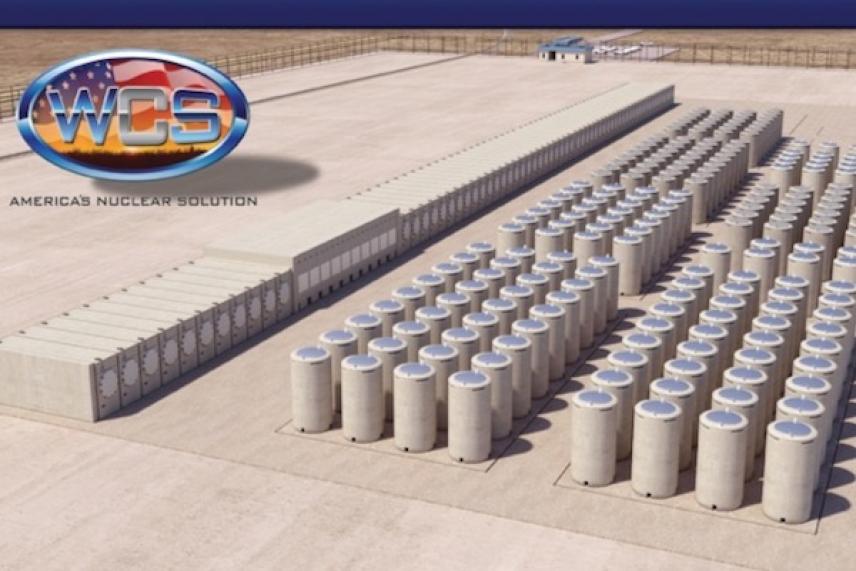 Concrete storage cylinders in a desert facility.
