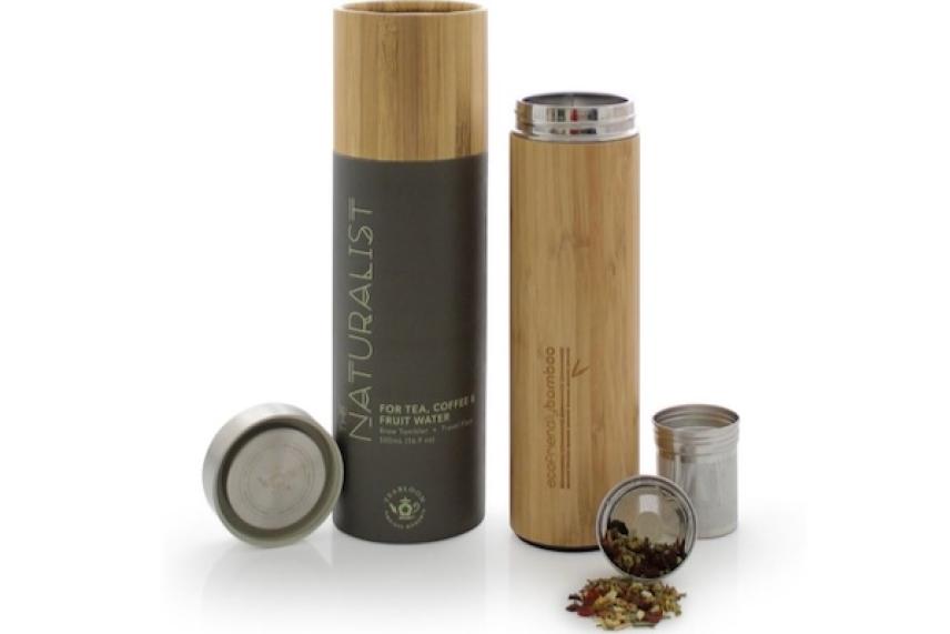 Bamboo tea infuser bottle with loose tea and packaging.