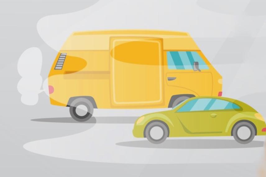 Yellow van and green car on a foggy road.