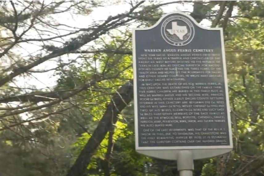 Texas historical marker in a wooded area.
