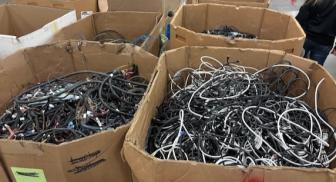 Boxes of cable and wiring await processing at URT.