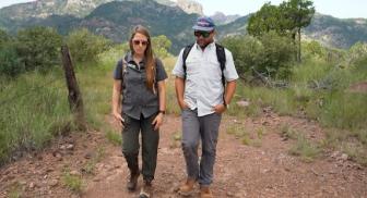 Kaylee French and Chet Garner trek through the Davis Mountains Preserve. 