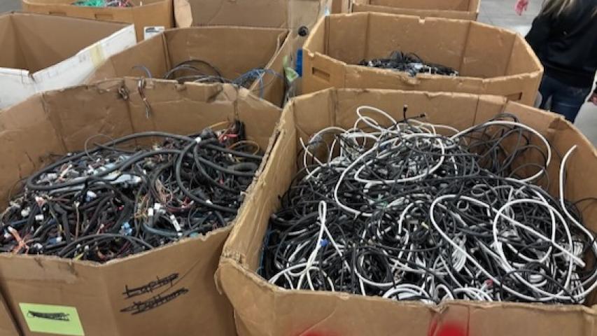 Boxes of cable and wiring await processing at URT.