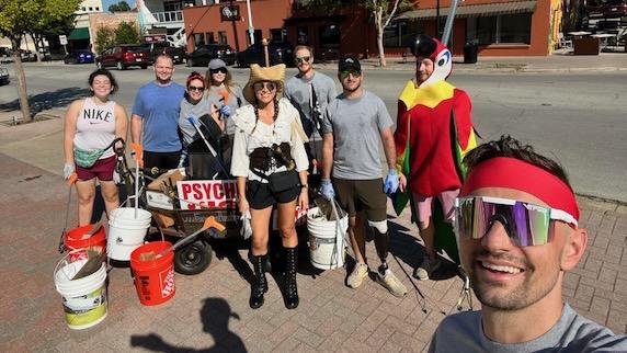 Members of the Fairmount Trash Pirates scour West Magnolia Street in Fort Worth on Halloween last year.