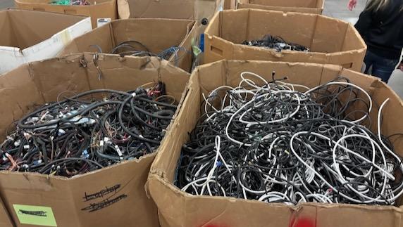 Boxes of cable and wiring await processing at URT.