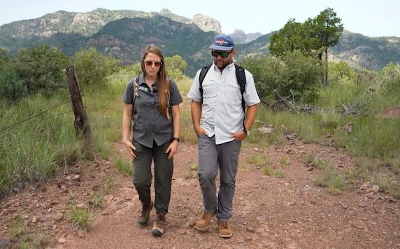 Kaylee French and Chet Garner trek through the Davis Mountains Preserve. 