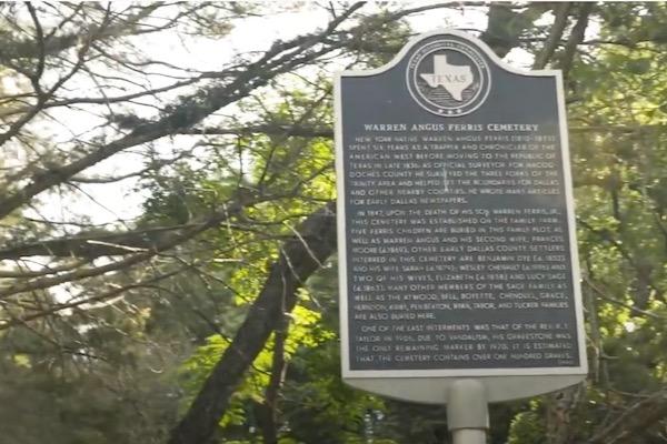 Texas historical marker in a wooded area.