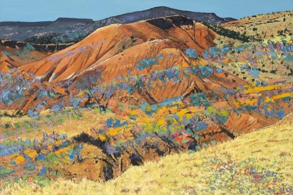 Colorful landscape painting of rugged, orange hills with patches of green and blue sky.